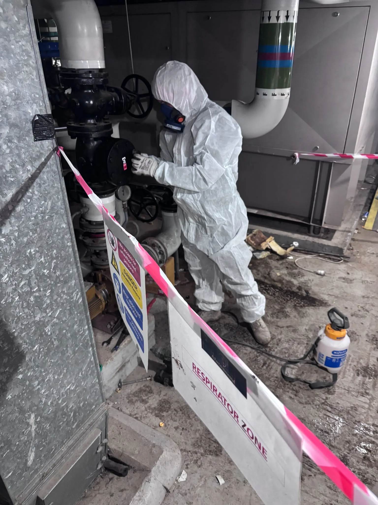 Asbestos artex removal from concrete soffit in Mile End