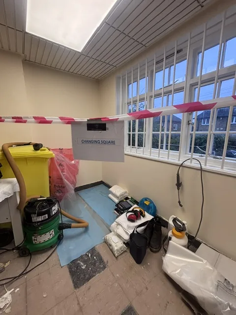 Asbestos floor tile and bitumen removal in Mile End